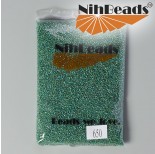 Zdjęcie - Koraliki NihBeads Silvr-Lined SH Trans-Rainbow Green
